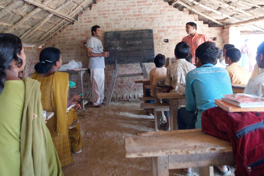 Dr Atul Rana teaching at a school in rural India. Gonda, Uttar Pradesh.