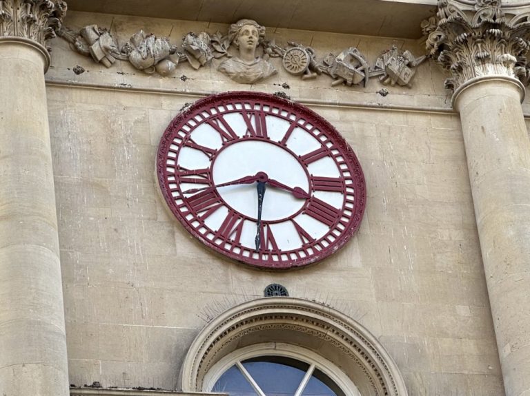 Clock on the Bristol Corn Exchange showing both Bristol Time and London Time — a historic symbol of Britain’s transition to standardised railway time in the 19th century.